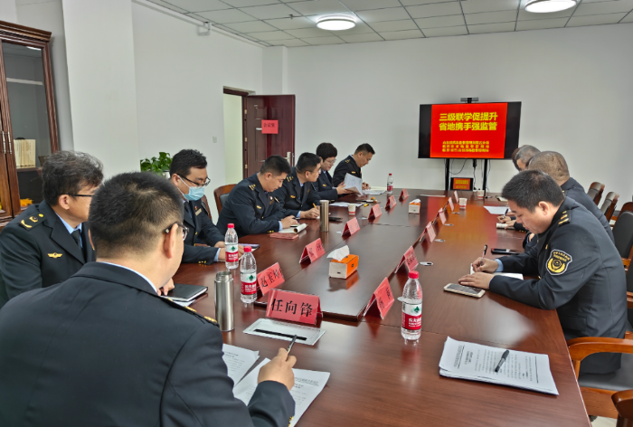 圖為“三級聯(lián)學”實踐活動現(xiàn)場。