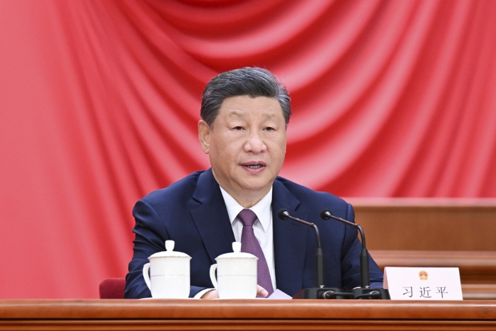 9月14日上午，中共中央、全國人大常委會(huì)在北京人民大會(huì)堂隆重舉行慶祝全國人民代表大會(huì)成立70周年大會(huì)。中共中央總書記、國家主席、中央軍委主席習(xí)近平出席會(huì)議并發(fā)表重要講話。 新華社記者 謝環(huán)馳 攝