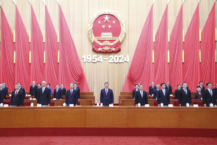 9月14日上午，中共中央、全國人大常委會(huì)在北京人民大會(huì)堂隆重舉行慶祝全國人民代表大會(huì)成立70周年大會(huì)。習(xí)近平、李強(qiáng)、趙樂際、王滬寧、蔡奇、丁薛祥、李希、韓正等出席大會(huì)。新華社記者 鞠鵬 攝